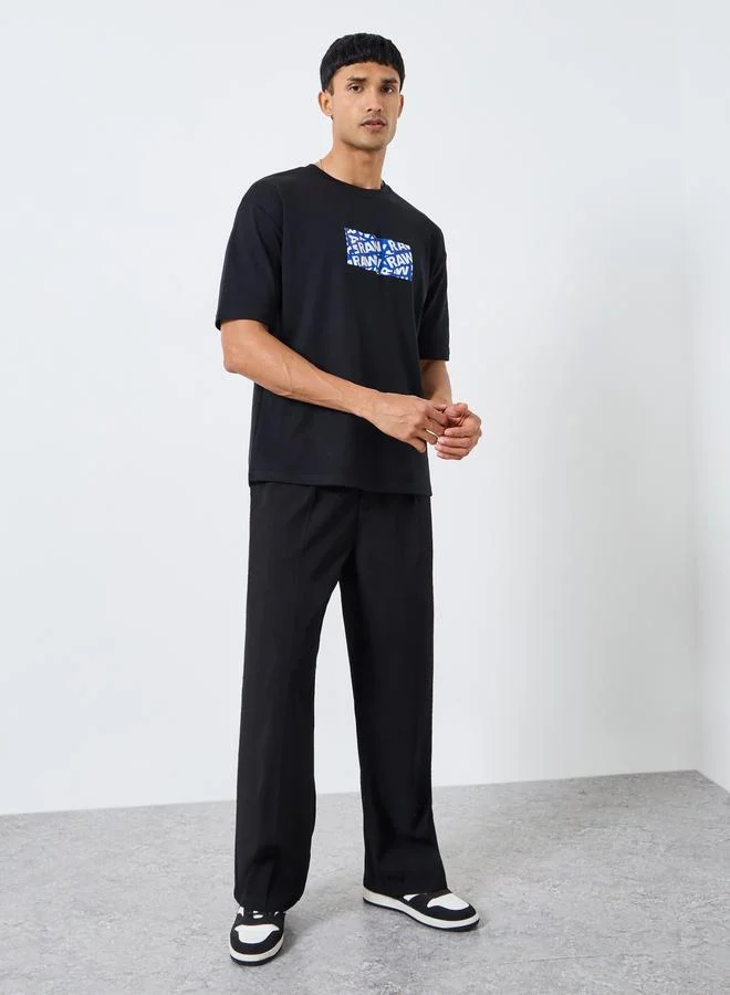 Styli Men Black Graphic Print Oversized T-Shirt